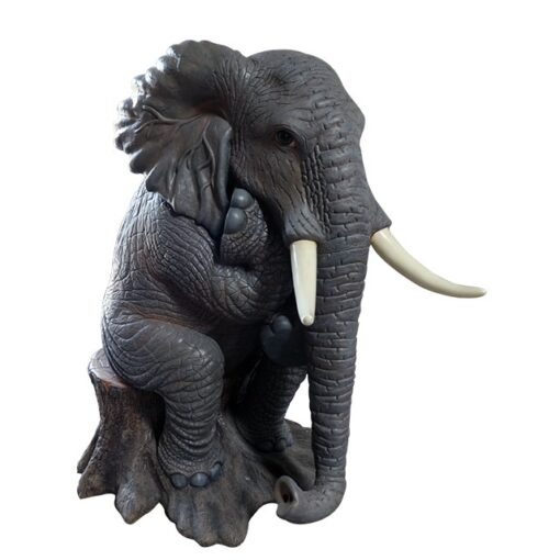 ELEPHANT BABY SITTING ON TREE TRUNK JR R-187
